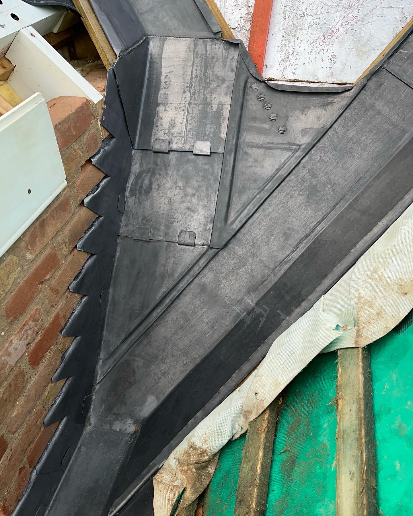 Traditional leadwork and roof detailing carried out by specialist leadworkers